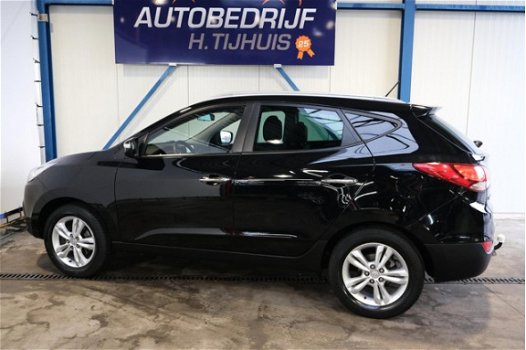 Hyundai ix35 - 2.0i Style Automaat - N.A.P. Airco, Cruise, Navi, PDC, Trekhaak - 1