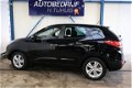 Hyundai ix35 - 2.0i Style Automaat - N.A.P. Airco, Cruise, Navi, PDC, Trekhaak - 1 - Thumbnail