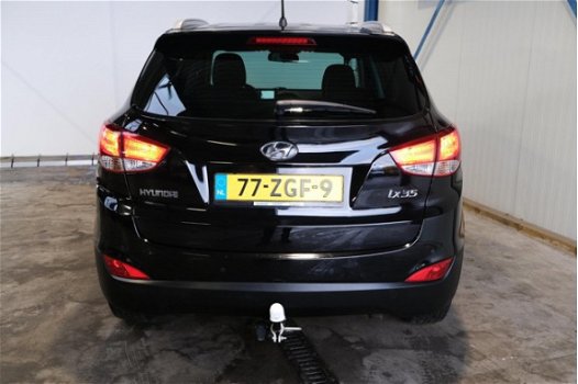 Hyundai ix35 - 2.0i Style Automaat - N.A.P. Airco, Cruise, Navi, PDC, Trekhaak - 1