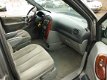 Chrysler Grand Voyager - 2.8 CRD LX.airco, cruise, controle.7.persoons - 1 - Thumbnail