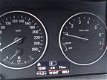 BMW 1-serie - 116i Business+ CRUISE CONTROL / NAVIGATIE / TREKHAAK - 1 - Thumbnail