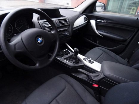 BMW 1-serie - 116i Business+ CRUISE CONTROL / NAVIGATIE / TREKHAAK - 1