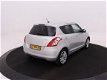 Suzuki Swift - 1.2 VVT 90pk S&S 5D Exclusive - 1 - Thumbnail