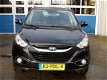 Hyundai ix35 - 2.0i 4WD i-Catcher - 1 - Thumbnail