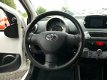 Toyota Aygo - 1.0 VVT-i Comfort Navi Airco Stoelverwarming Elec Pakket Led/Dag Rij verlichting Apk - 1 - Thumbnail