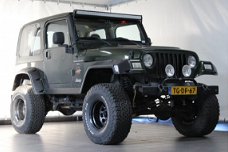 Jeep Wrangler - 4.0 I Sahara / LPG G3 / Youngtimer / Verhoogd