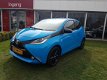 Toyota Aygo - 1.0 VVT-i 69pk 5D x-cite | LM Velgen, Camera, Privacy Glass, Zeer compleet - 1 - Thumbnail