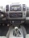 Nissan Navara - 2.5 dCi King Cab - 4WD - Airco - Cruise Control - 1 - Thumbnail