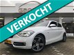 BMW 1-serie - 114i Upgrade Edition Org.NL|M|Navi groot|Sportstoelen|Parelmoer|Leer - 1 - Thumbnail