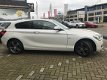 BMW 1-serie - 114i Upgrade Edition Org.NL|M|Navi groot|Sportstoelen|Parelmoer|Leer - 1 - Thumbnail