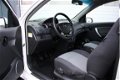 Chevrolet Aveo - 1.2 16V LS+ Airco/Stuurbekrachtiging/Elek.Ramen/C.V./Radio.CD/LM.Velgen/65.638km - 1 - Thumbnail