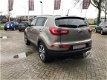 Kia Sportage - 2.0 X-clusive Navigatie, camera, PDC, Clima control, keyless , leer , etc - 1 - Thumbnail