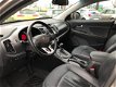 Kia Sportage - 2.0 X-clusive Navigatie, camera, PDC, Clima control, keyless , leer , etc - 1 - Thumbnail