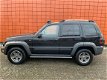 Jeep Cherokee - 3.7 V6 Renegade Uniek/1e eigenaar/41.604km/Automaat/Leer/AWD/Navi/Airco/204PK - 1 - Thumbnail