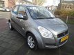 Suzuki Splash - 1.0 VVT Comfort met o.a. Airco, LM-velgen en Lage KM-stand - 1 - Thumbnail