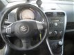 Suzuki Splash - 1.0 VVT Comfort met o.a. Airco, LM-velgen en Lage KM-stand - 1 - Thumbnail