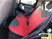 Peugeot 107 - Urban Move 1.0XS Red Airco 5drs ElekPack - 1 - Thumbnail