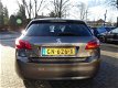 Peugeot 308 - 1.2 PureTech 130PK Automaat Style 1eEig/Navi/Panorama/DAB - 1 - Thumbnail