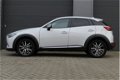 Mazda CX-3 - 2.0 SkyActiv-G 120 GT-M | NL- auto | Navigatie | Set winterbanden | - 1 - Thumbnail