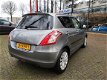 Suzuki Swift - 1.2 Exclusive 5 deurs Clima Cruise Navigatie Rijklaar - 1 - Thumbnail