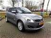 Suzuki Swift - 1.2 Exclusive 5 deurs Clima Cruise Navigatie Rijklaar - 1 - Thumbnail