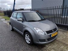 Suzuki Swift - 1.3 Comfort , 86125 km, AIRCO, CV met afst. bed., lichtmetalen velgen