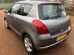 Suzuki Swift - 1.3 GA 2 JAAR APK--AIRCO--SERVICE ONDERHOUD - 1 - Thumbnail