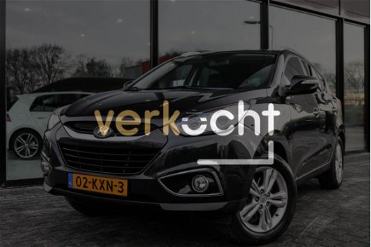 Hyundai ix35 - 2.0i Navigatie Trekhaak Panoramadak Bluetooth Leer Cruise Clima 163pk - 1