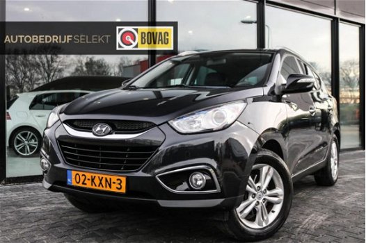 Hyundai ix35 - 2.0i Navigatie Trekhaak Panoramadak Bluetooth Leer Cruise Clima 163pk - 1