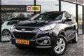 Hyundai ix35 - 2.0i Navigatie Trekhaak Panoramadak Bluetooth Leer Cruise Clima 163pk - 1 - Thumbnail