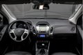 Hyundai ix35 - 2.0i Navigatie Trekhaak Panoramadak Bluetooth Leer Cruise Clima 163pk - 1 - Thumbnail