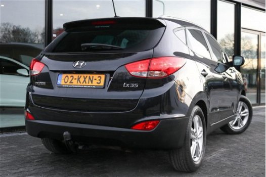 Hyundai ix35 - 2.0i Navigatie Trekhaak Panoramadak Bluetooth Leer Cruise Clima 163pk - 1