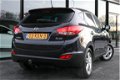 Hyundai ix35 - 2.0i Navigatie Trekhaak Panoramadak Bluetooth Leer Cruise Clima 163pk - 1 - Thumbnail