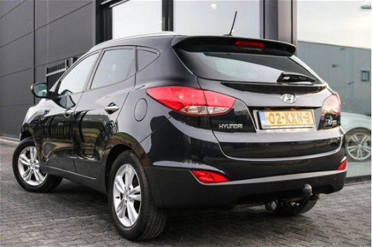 Hyundai ix35 - 2.0i Navigatie Trekhaak Panoramadak Bluetooth Leer Cruise Clima 163pk - 1