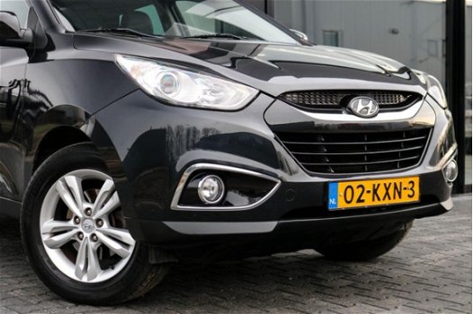 Hyundai ix35 - 2.0i Navigatie Trekhaak Panoramadak Bluetooth Leer Cruise Clima 163pk - 1