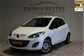 Mazda 2 - 2 1.3 Hanabi 2013/ Navi/ PDC/ Stuur bed./ Stoel verw./ Airco/ Elek ramen + Spiegels/ Boekj - 1 - Thumbnail