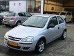 Opel Corsa - 1.2-16V Rhythm Cruise/ El.ramen/ MFC/ NAP/ APK - 1 - Thumbnail