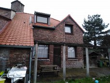 Mooie woning te Genk te koop.