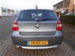 BMW 1-serie - 120D 5-DEURS NAVIGATIE/I-DRIVE/CRUISE-CONTROL/PARKEERSENSOREN - 1 - Thumbnail