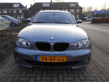 BMW 1-serie - 120D 5-DEURS NAVIGATIE/I-DRIVE/CRUISE-CONTROL/PARKEERSENSOREN - 1