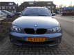 BMW 1-serie - 120D 5-DEURS NAVIGATIE/I-DRIVE/CRUISE-CONTROL/PARKEERSENSOREN - 1 - Thumbnail