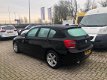 BMW 1-serie - 116i Business+ Automaat / Navigatie / 5-deurs - 1 - Thumbnail