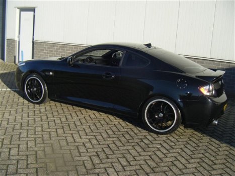 Hyundai Coupé - Zwart nw Model 2009 Topper - 1