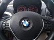 BMW 1-serie - 114i EDE Business+ - 1 - Thumbnail