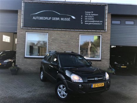 Hyundai Tucson - 2.0i Dynamic Airco, Lichtmetaal, Centraal, Elektr. ramen, 1 particuliere eigenaar - 1