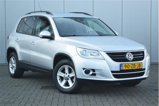 Volkswagen Tiguan - 1.4 TSI Comfort&Design 4Motion Clima Airco Cruise Trekhaak Getint Glas Dakrails - 1