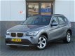 BMW X1 - SDrive18d Executive NAVIGATIE GARANTIE (bj2011) - 1 - Thumbnail