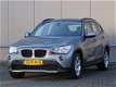 BMW X1 - SDrive18d Executive NAVIGATIE GARANTIE (bj2011) - 1 - Thumbnail
