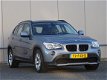 BMW X1 - SDrive18d Executive NAVIGATIE GARANTIE (bj2011) - 1 - Thumbnail