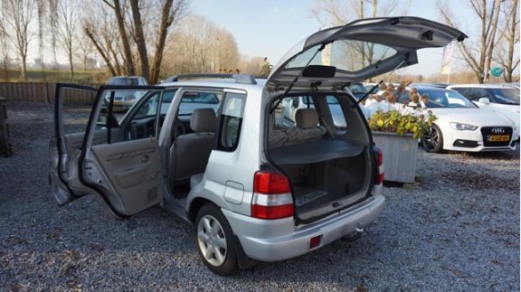 Mazda Demio - 1.3 GLX hele nette hoge instap auto met airco stuurbk rijd zeer goed.2e eigen - 1